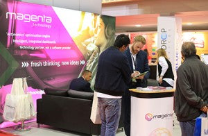 A backlit display wall at an exhibition
