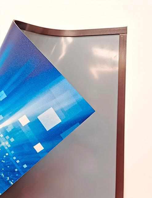 Magnetic display panel on rollable plastic
