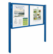 Blue double door exterior notice board and posts