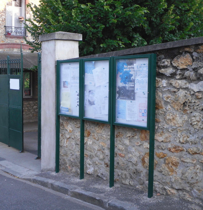 Three poster display cases and posts